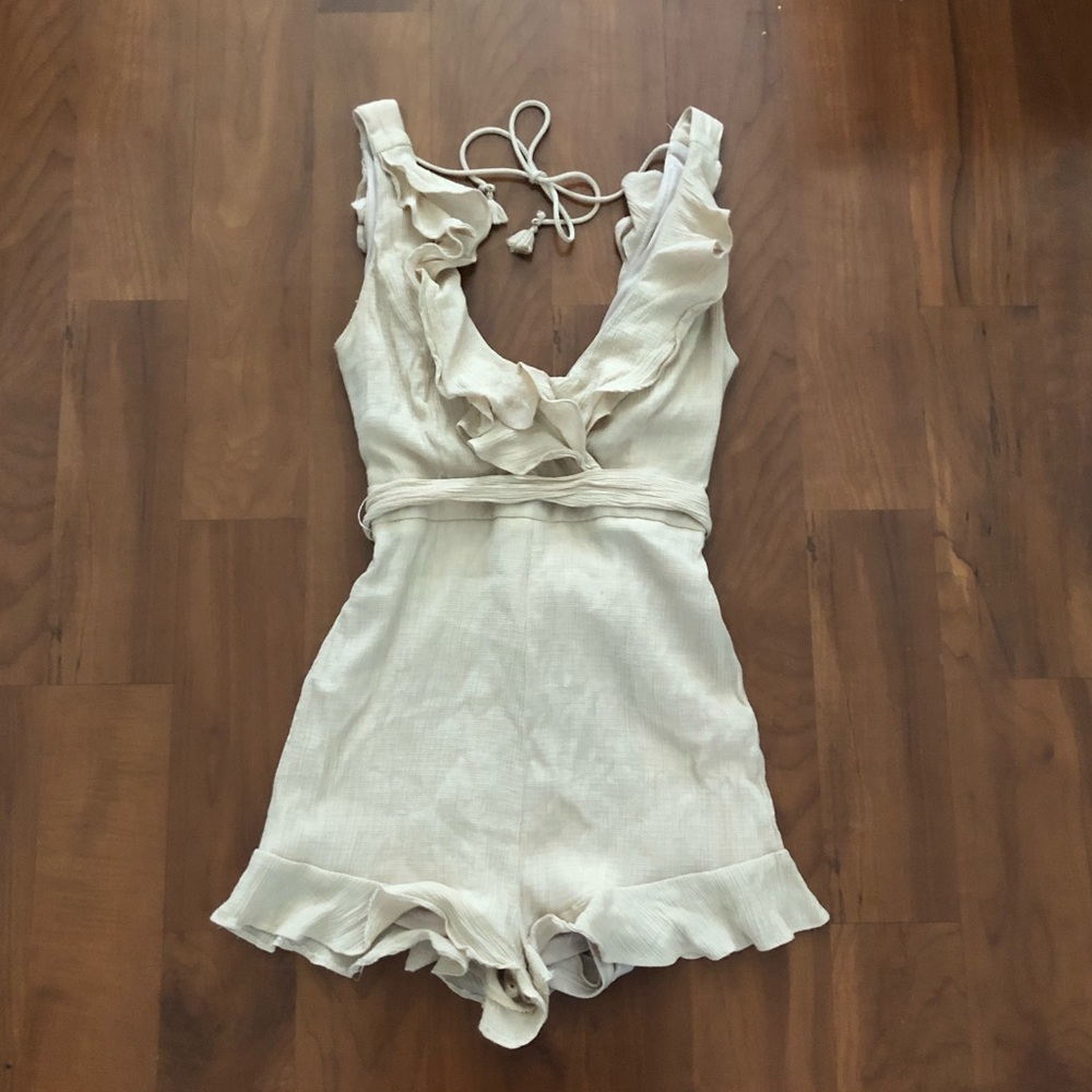Essue, cream romper.